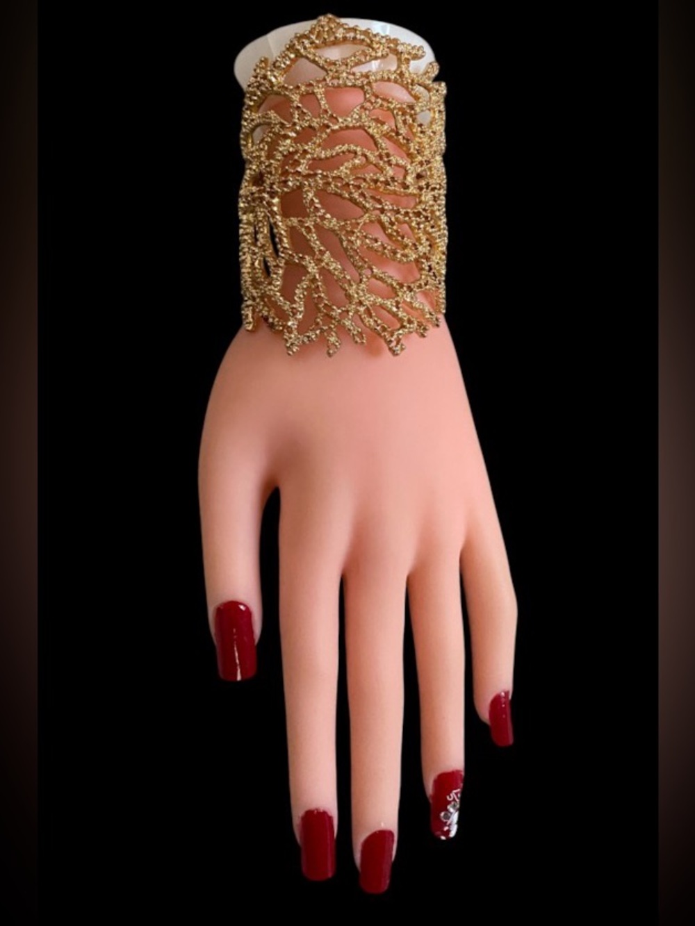 Zara women’s goldtone rigid coral branch wide cuff bracelet